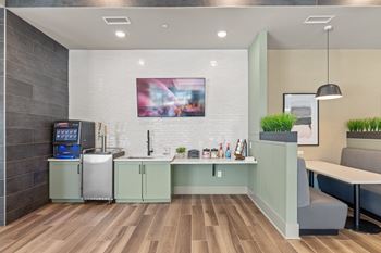 Clubroom with coffee bar, lounge seating and tv